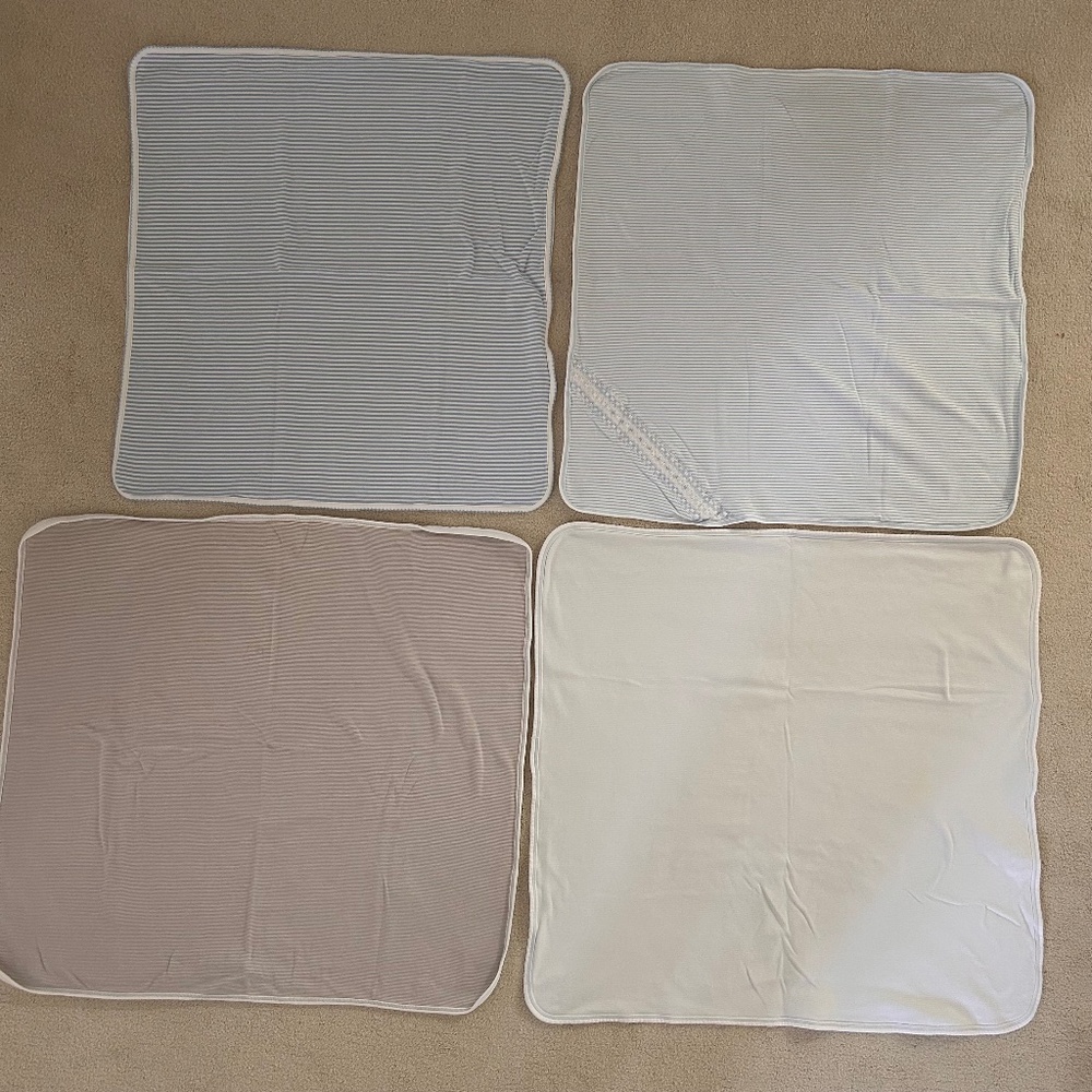Four Magnolia Baby pima cotton blankets